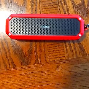 Coby bluetooth speaker with flashlight